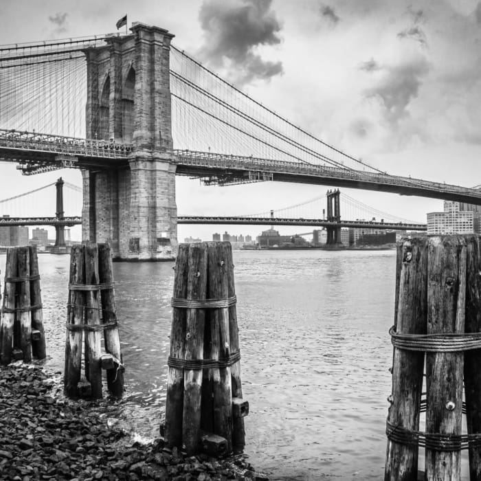 Brooklyn Bridge and wooden piles in the East River, New York City NM005