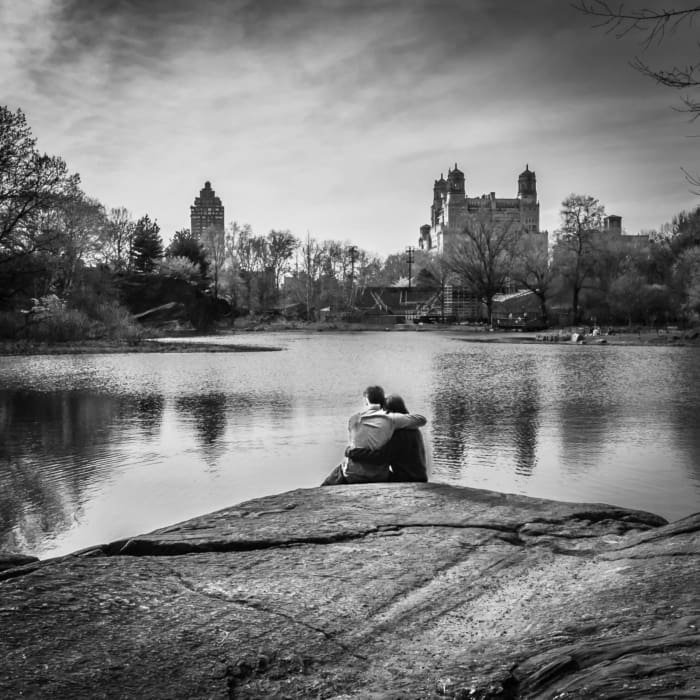 Couple embracing beside the Turtle Pond in Central Park, New York City NM002