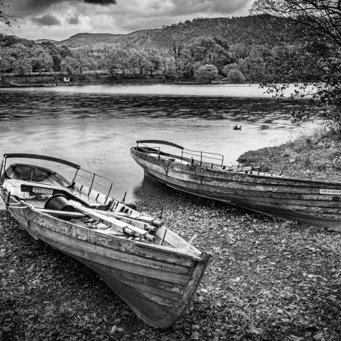 Beached rowing boats on Derwent Water, near Keswick, Cumbria, England. EM005