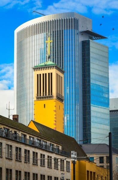 Matthauskirche (St Matthew&#039;s Church) and the Pollux Tower in the Gallus district of Frankfurt am Main, Hesse, Germany. FF020