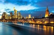 Dusk on the Main as a barge passes in Frankfurt am Main, Hesse, Germany FF021