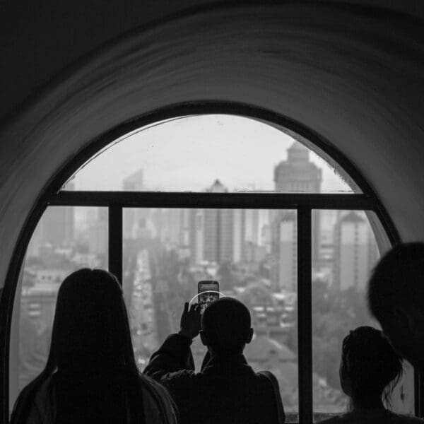 Buddhist monk takes a photograph from the Giant Wild Goose Pagoda, Xi&#039;an, China. ZM006