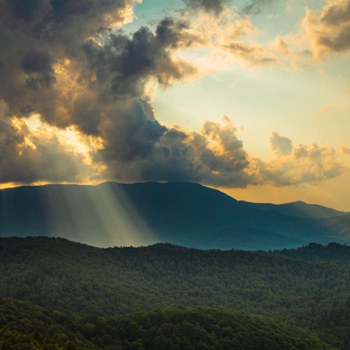 Sunlight passing through clouds at Three Knob Overlook on the Blue Ridge Parkway, North Carolina, USA NC003.