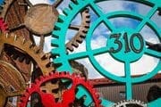 Decorative display of gear wheels at the River Arts District, Asheville, North Carolina, USA. NC011