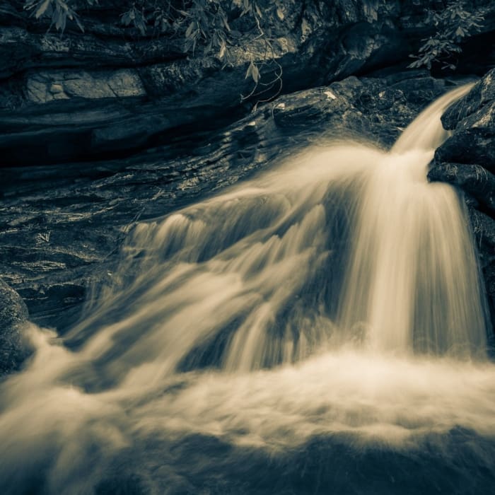 Cyan toned image of Duggers Creek Falls, Linville, North Carolina, USA. CM010