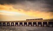 Train crossing the Tay Rail Bridge, Dundee, Scotland. DD045