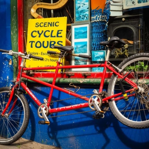 Tandem secured outside cycle tour office in Edinburgh, Scotland. EH013