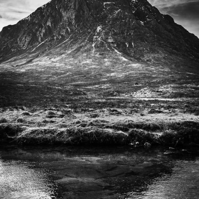 Buachaille Etive Mor casts a shadow in the River Coupall, Rannoch Moor, Scotland. SM026