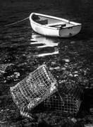 Moored boat and lobster pots, Connemara, Ireland. IM001