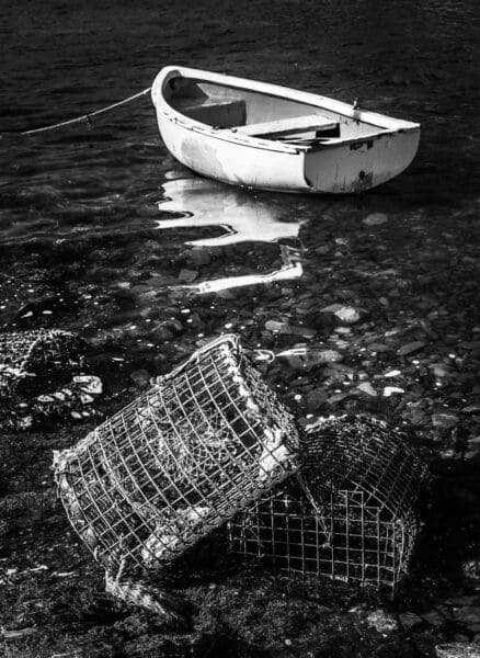 Moored boat and lobster pots, Connemara, Ireland. IM001