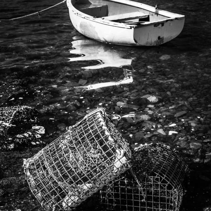 Moored boat and lobster pots, Connemara, Ireland. IM002