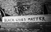 Slogan painted under the Tay Rail Bridge, Wormit, Fife, Scotland. SM058