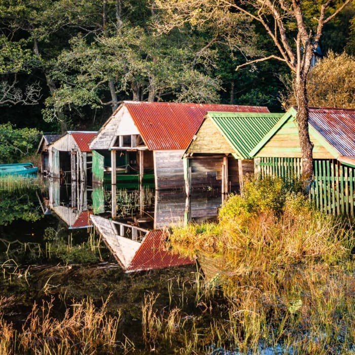 Boathouses on Loch Ard, The Trossachs, Scotland. TR001