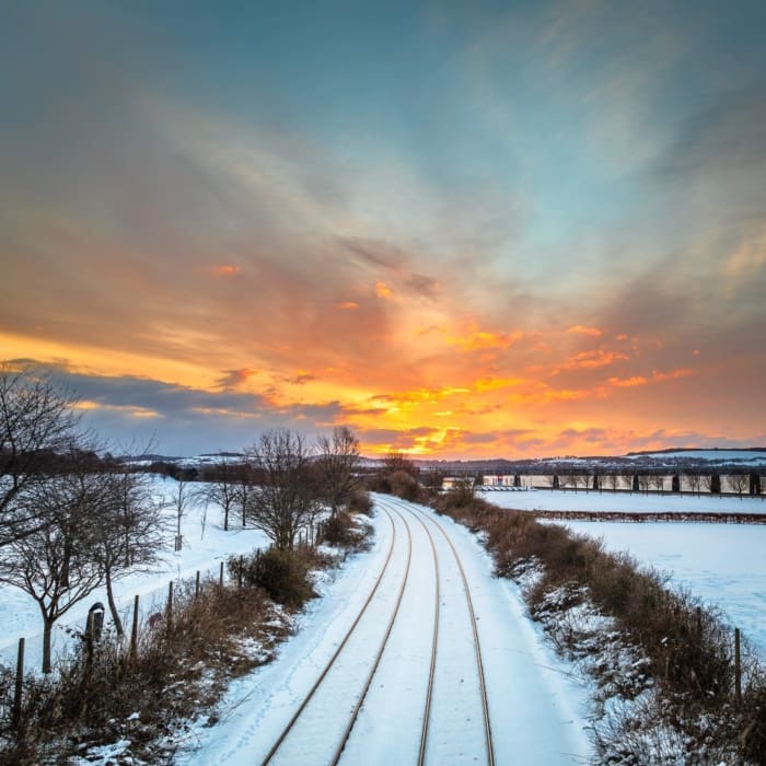 Winter sunrise over the Dundee to Perth railway line, Dundee, Scotland. DD135