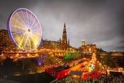 Giant Ferris Wheel and other attractions in Princes Street Gardens on New Years Day, Edinburgh, Scotland,  EH007