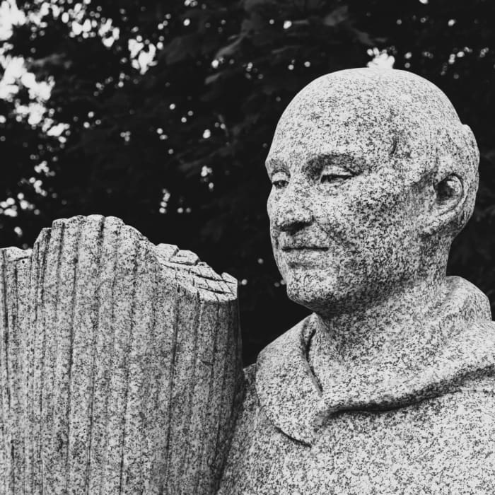 Statue of monk with willow reeds, Graiguenamanagh, County Kilkenny, Ireland. BR018