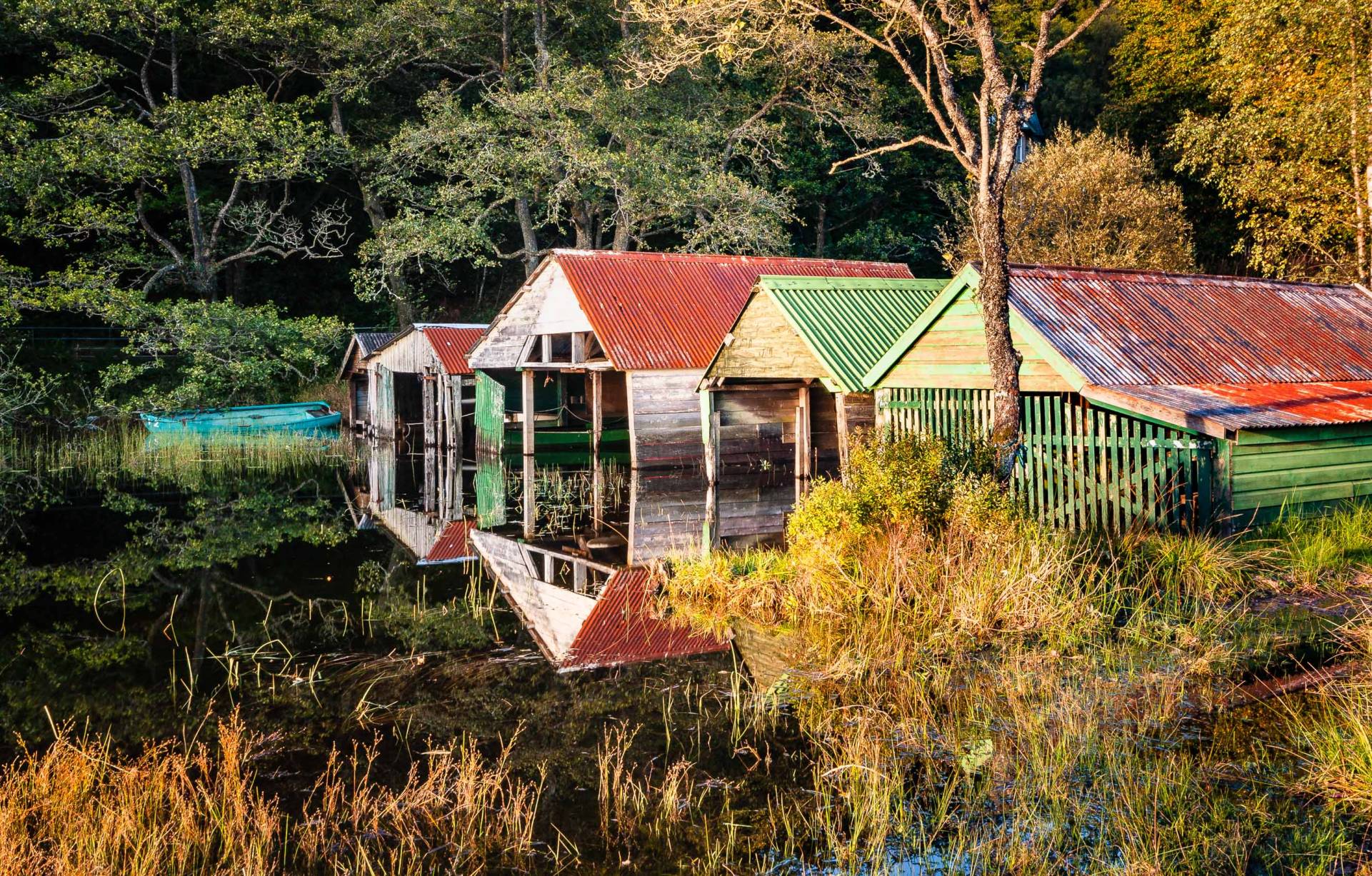 Boathouses on Loch Ard, The Trossachs, Scotland.